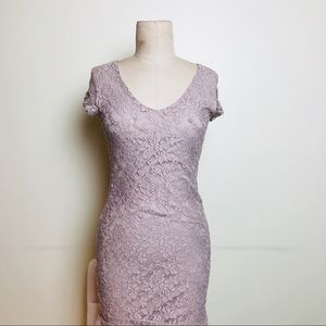 Party or occasion wear sheath tube dress.